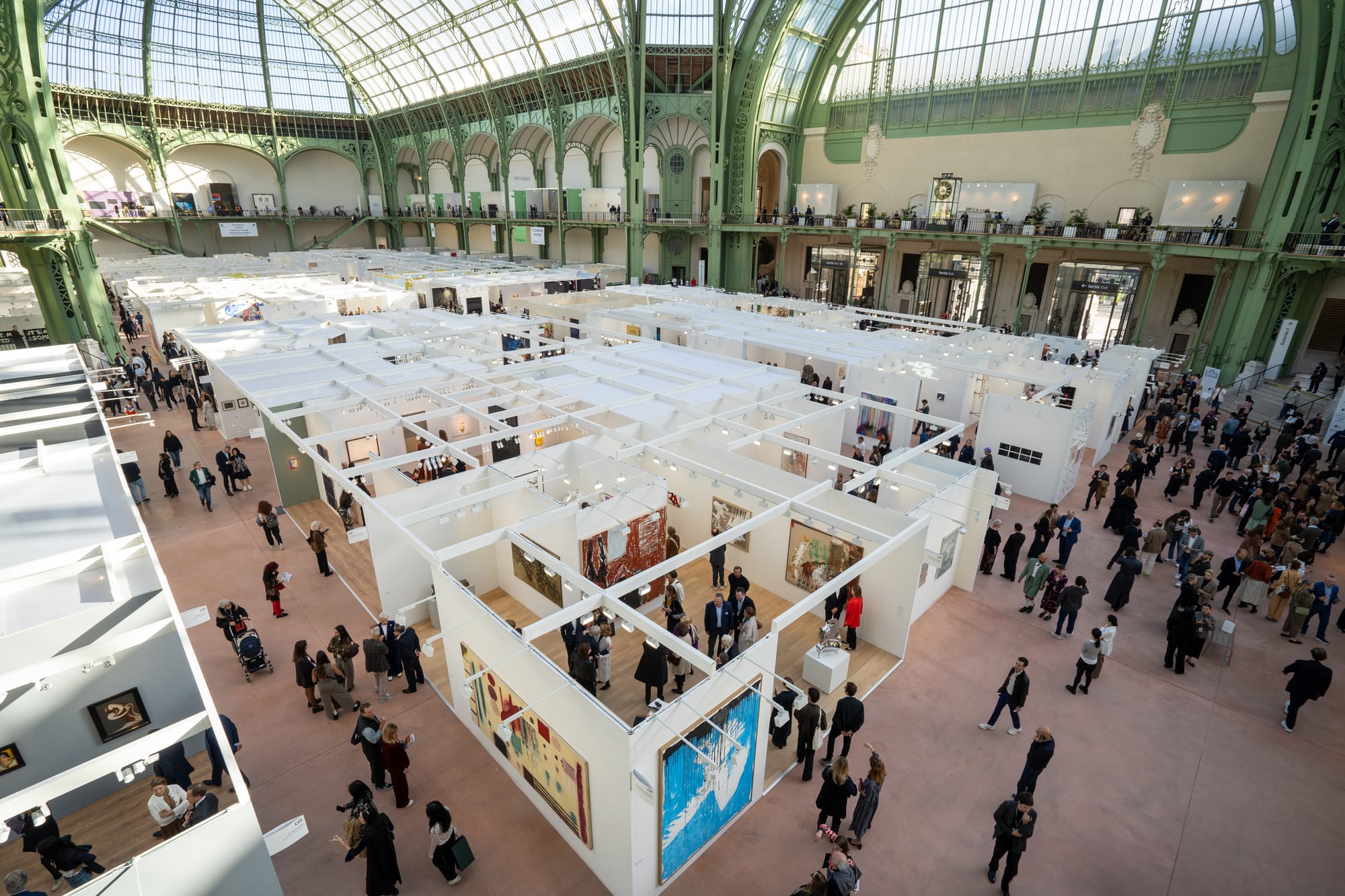 An exhibition booths at Art Basel Paris 2024, displaying a variety of contemporary artworks.