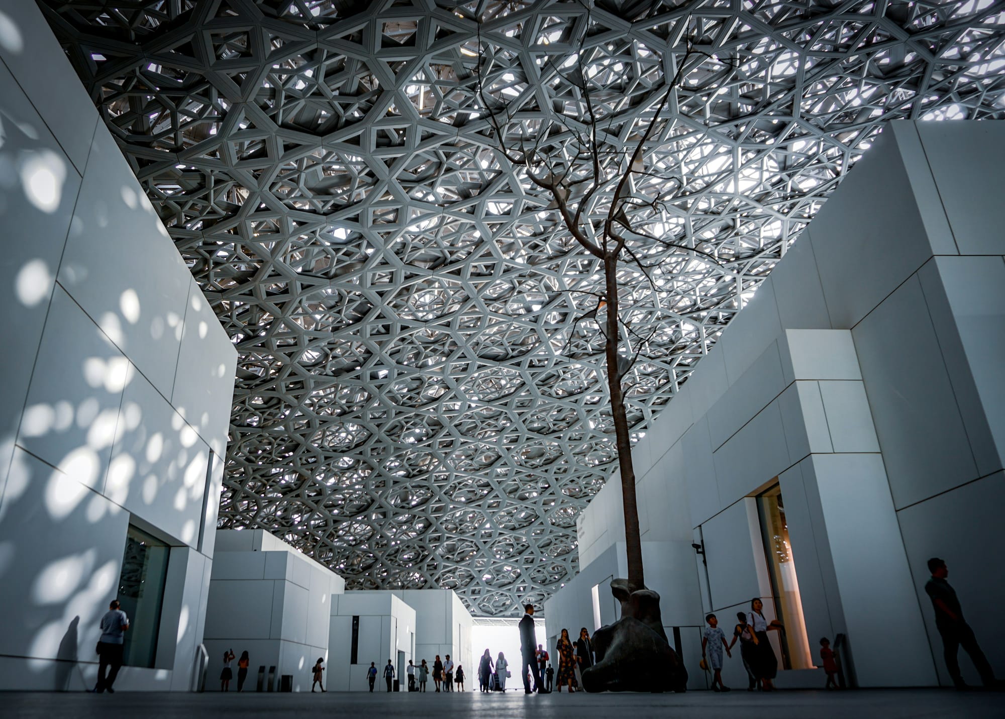 A spacious hall at Sotheby’s, with refined decor, soft lighting.