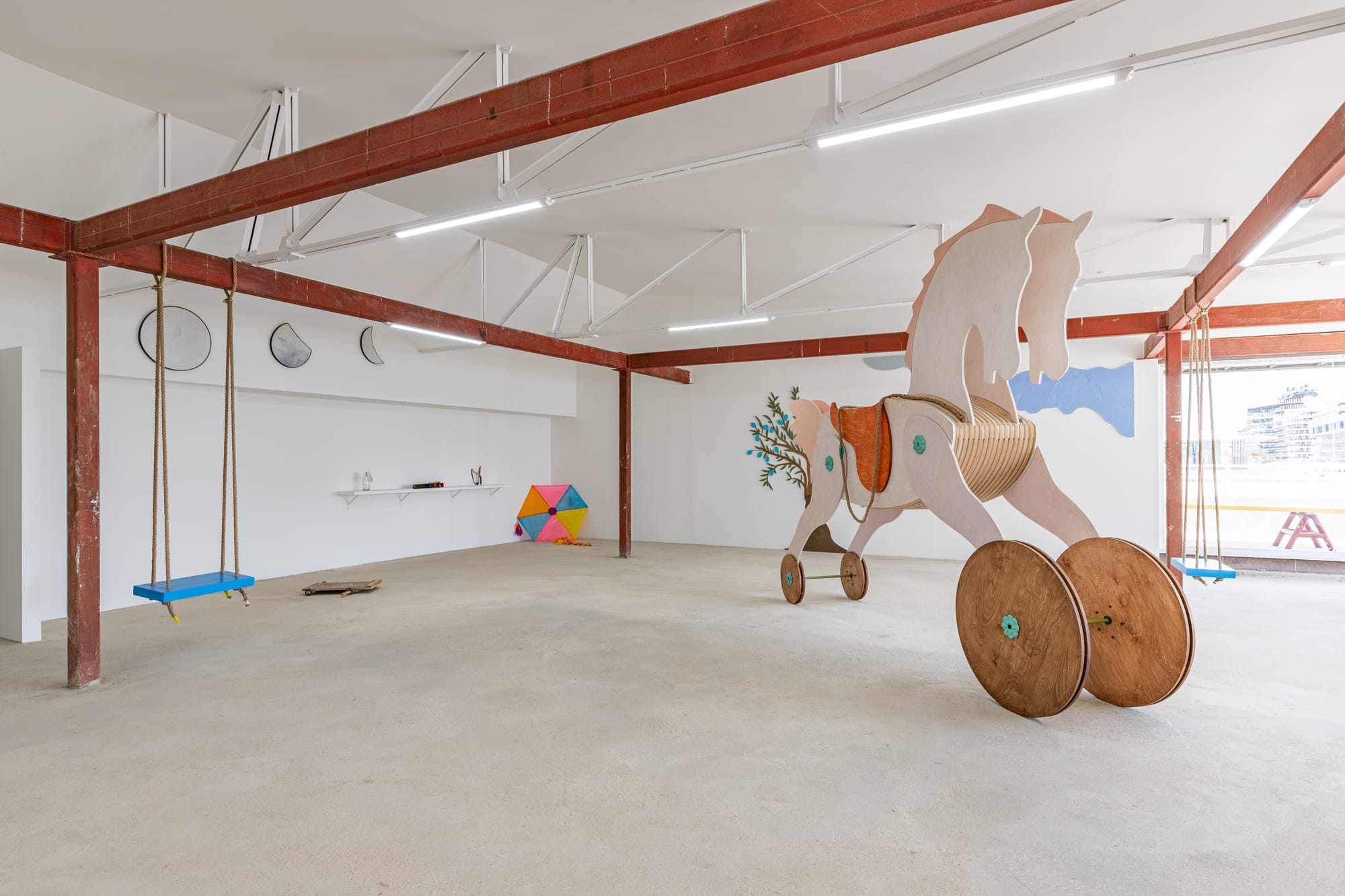 Marwan Rechmaoui’s site-specific playground, where swings and an augmented toy horse become instruments