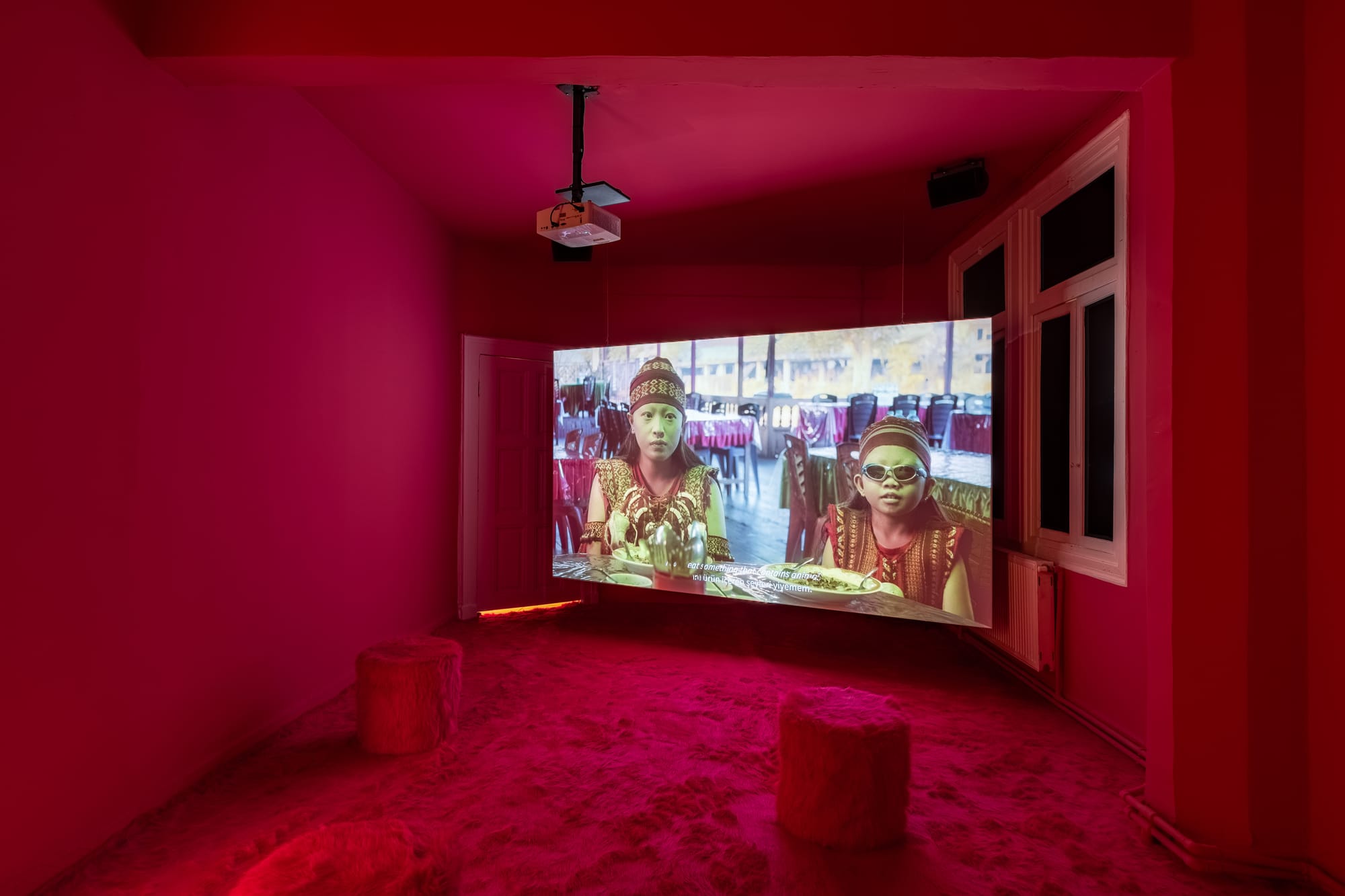 Natasha Tontey’s video installation about following of girls interwoven with Minahasan culture.