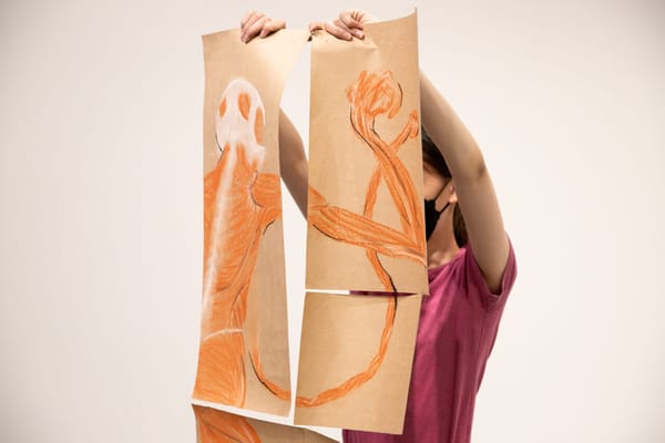 Teen working on artwork during Emily Carr University teen program.